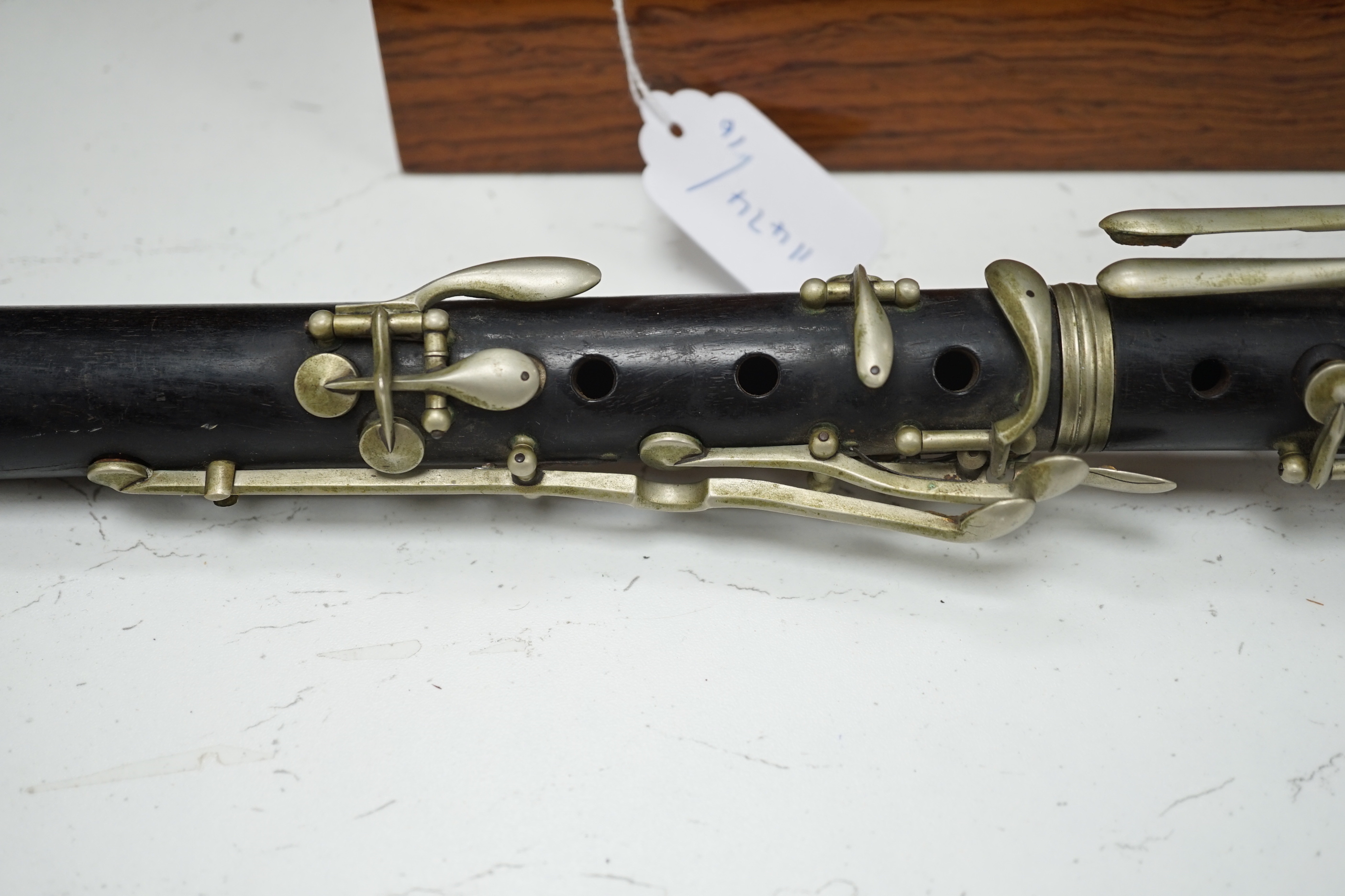 An unmarked wooden clarinet